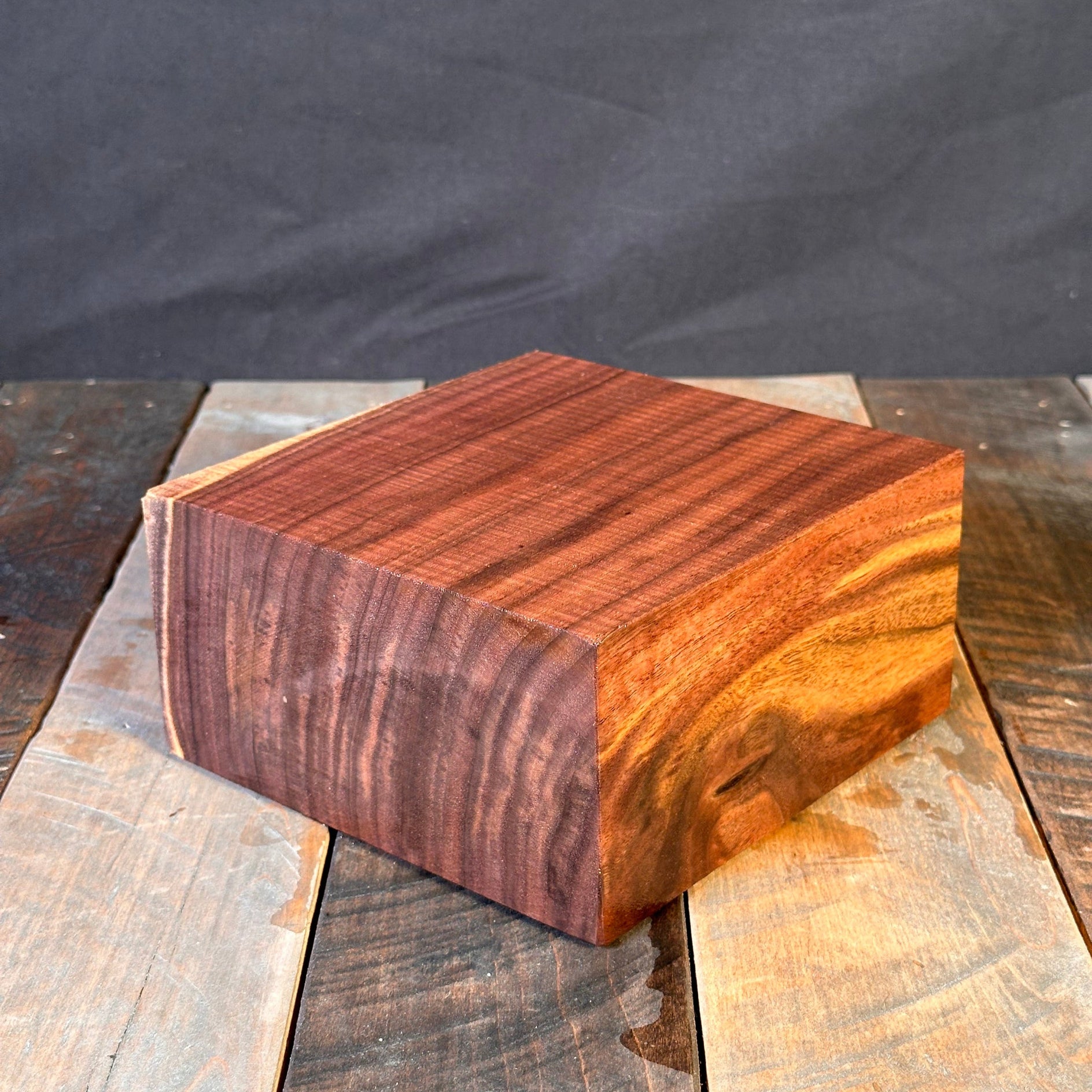 Close-up of various wooden planks with different textures and colors.