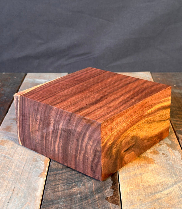 Close-up of various wooden planks with different textures and colors.